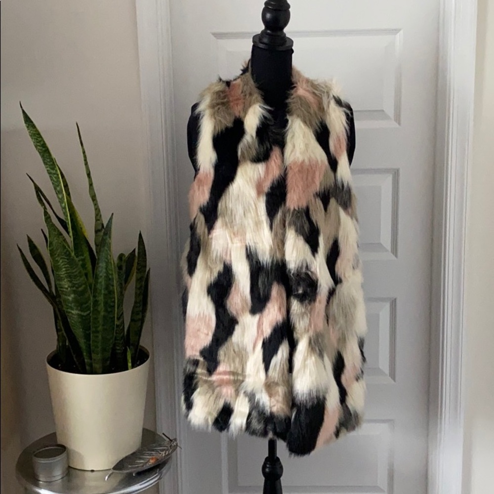 Never worn faux fur vest